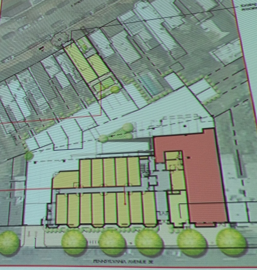 The site plan. The 5,000 retail space is indicated in red. The adjacent yellow area is the site of the bulk of the mixed use project. The Shotgun House site in in yellow near the top of the image.